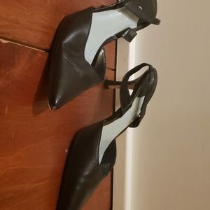 Strapped black pumps